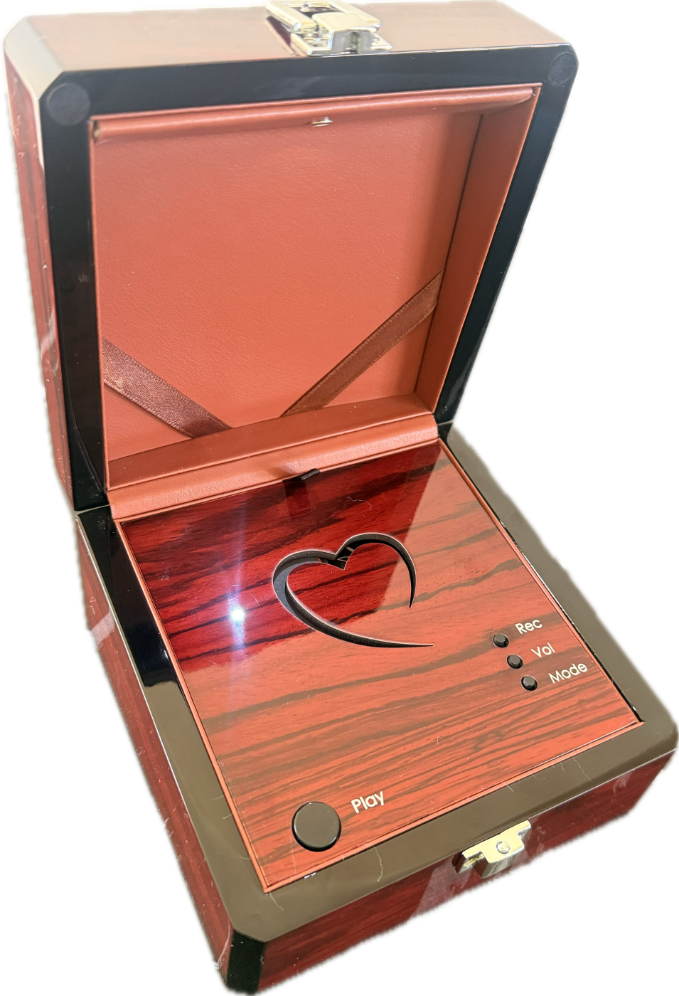 The 4Eva Heard box open, showing its leather-lined photo holder and recording controls